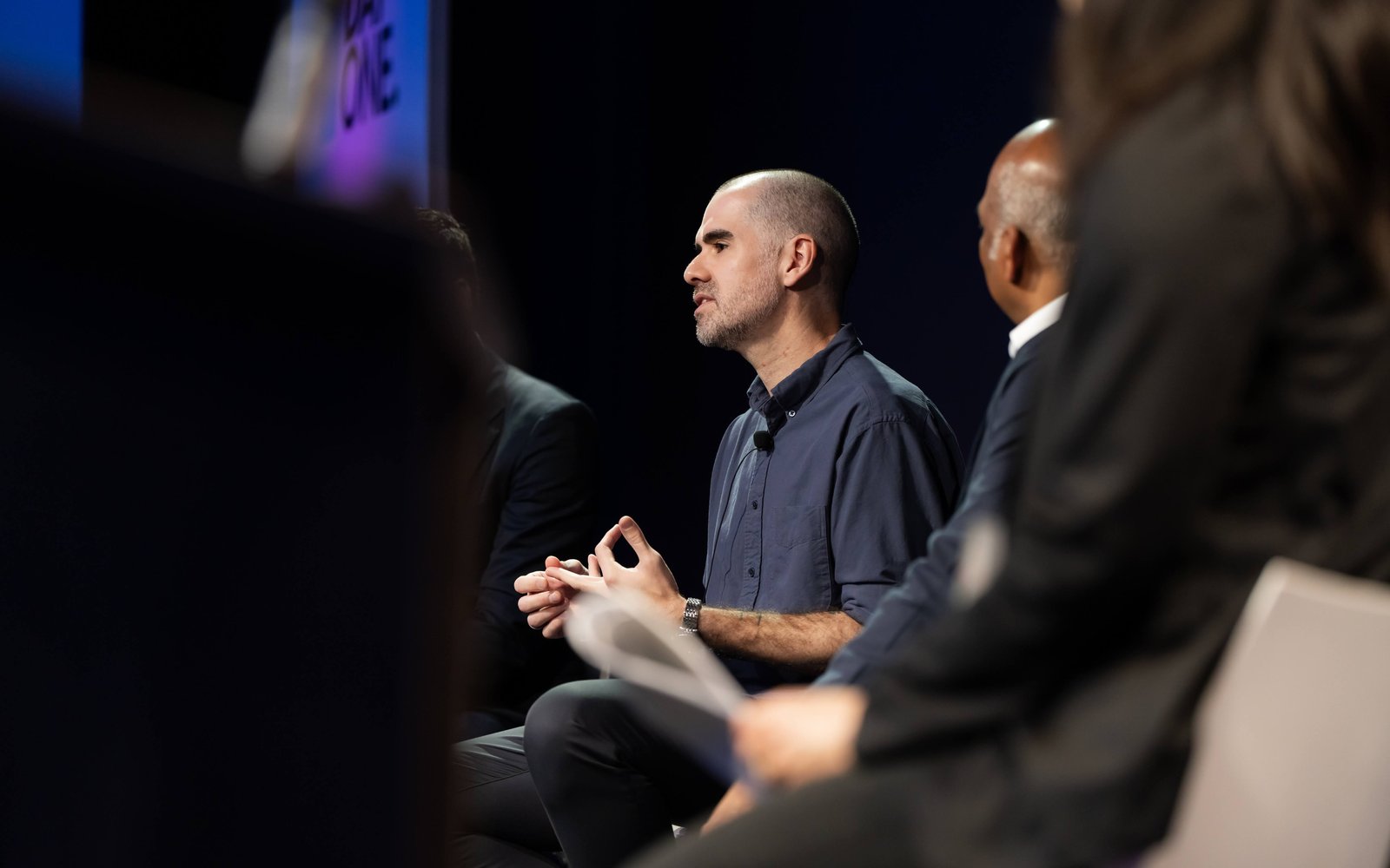 Henrique Loyola speaking on a panel at the From Day One conference in Silicon Valley